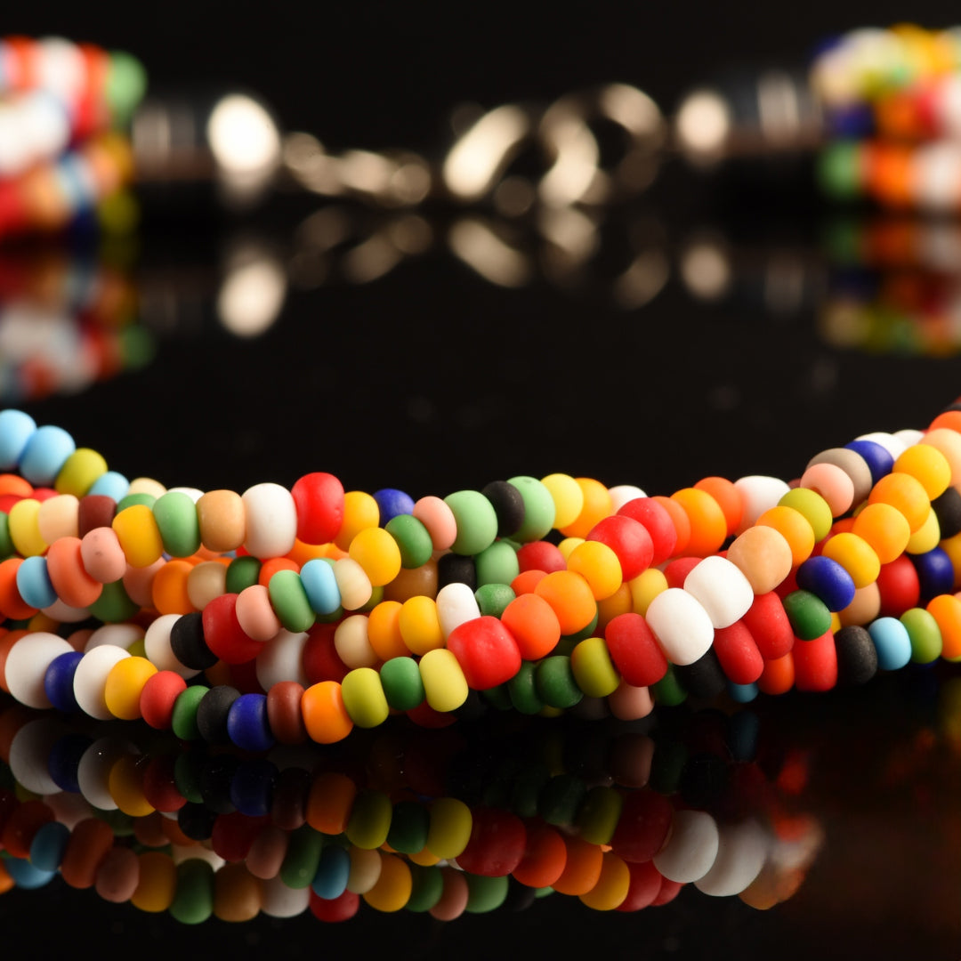 Collana Torchon Mat di Murano, 9 fili intrecciati di rare perle conteria satinato pastello vintage anni '80 (lunghezza circa 50 cm), chiusura anallergica.