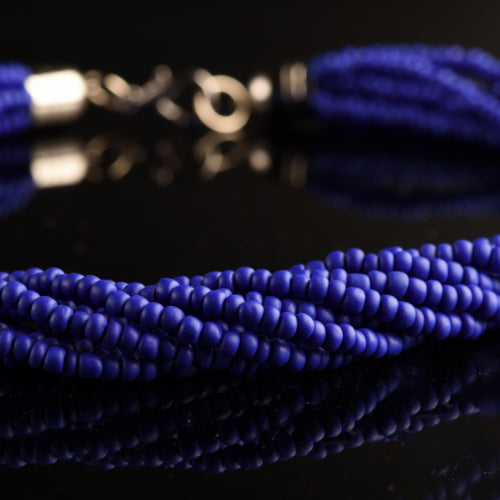 Collana Torchon Mat di Murano, 9 fili intrecciati di rare perle conteria satinato pastello vintage anni '80 (lunghezza circa 50 cm), chiusura anallergica.